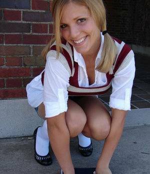 Blonde student Karen exposes her white underwear during upskirt action on justmyfans.pics