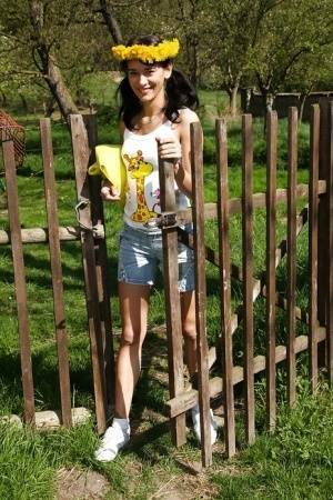 Sweet brunette teen Amanda undressing her clothes outdoors on justmyfans.pics