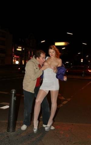 Slutty LaMia in white stockings topless sucks on her knees in the street on justmyfans.pics