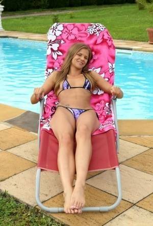 PrettySara Kay removing her bikini to show her naughty bits & toy poolside on justmyfans.pics