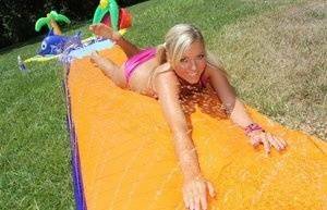 Young blonde Ally Kay ends a water fight by having sex in backyard on justmyfans.pics