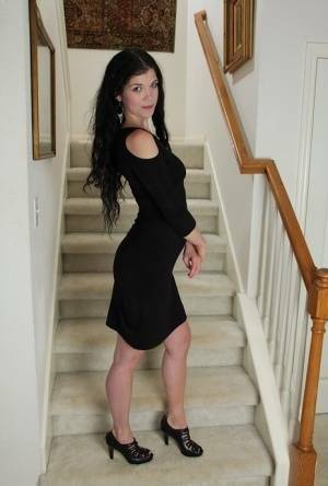 Clothed milf beauty Veronica Stewart is taking off her black dress on justmyfans.pics
