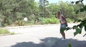 Blonde female Nikki Dream can't hold her pee any longer and squats on roadway on justmyfans.pics
