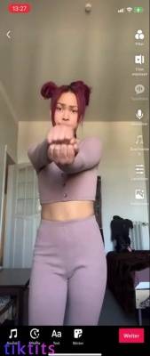 Young TikTok girl does a nude dance with TikTok signature moves - leaknud.com