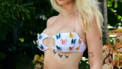Lottie Moss Poses Up a Storm as She Stuns in a Butterfly PLT Bikini on justmyfans.pics