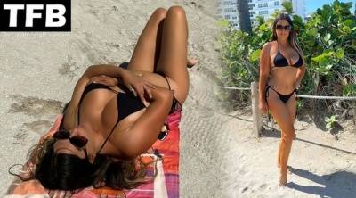 Claudia Romani Shows Off Her Curves on the Beach on justmyfans.pics