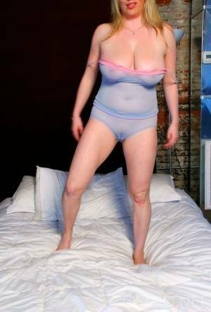 Blond amateur Maggie Green sports a cameltoe while unleashing her big naturals on justmyfans.pics