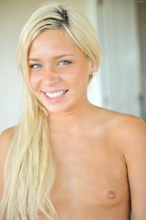Sweet blonde teen plays with her labia lips before self fisting her pussy on justmyfans.pics