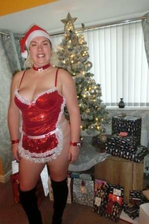 Busty blonde Barby masturbates her shaved pussy near the Christmas tree on justmyfans.pics