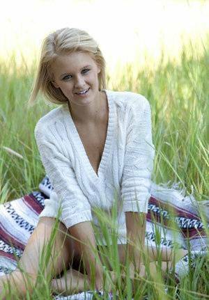 Blue eyed blonde teen Marie casts off her clothes to pose nude in a field on justmyfans.pics